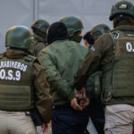 Llegan al Juzgado de Garantia de San Bernardo los dos ultimos detenidos por el caso del robo con homicidio de un menor de 13 anos en San Bernardo Diego Martin/Aton Chile