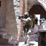 Cisjordania: 11 países europeos y Canadá anuncian sanciones al comercio con colonias israelíes Militar israelí en Cisjordania.