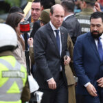 Ministro de Seguridad, Martín Arrau, asiste a la ceremonia de funeral del cabo segundo de Carabineros de Chile, Cristopher Aguilera.